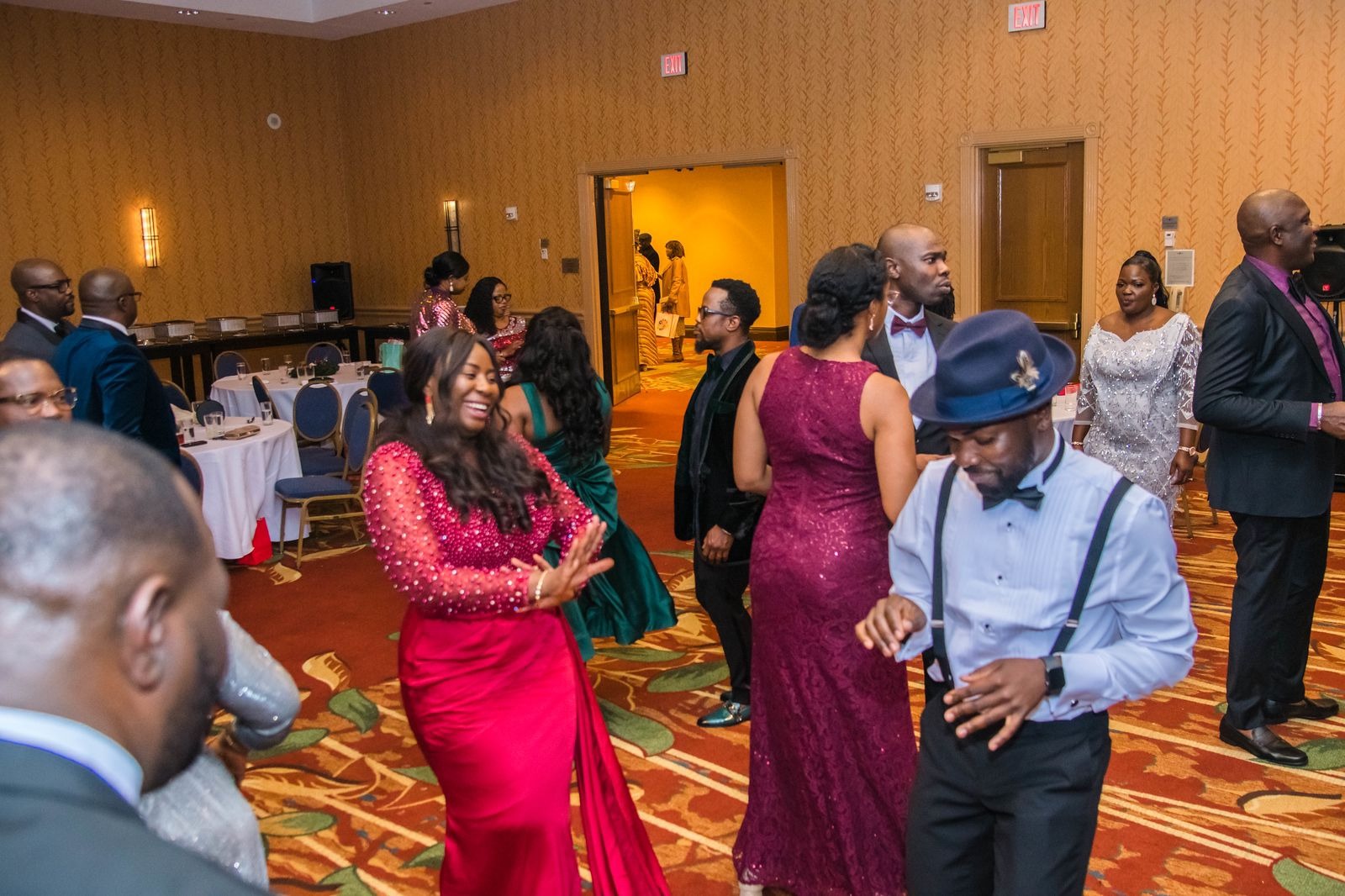 Atlanta MC on stage at a formal gala with professional lighting