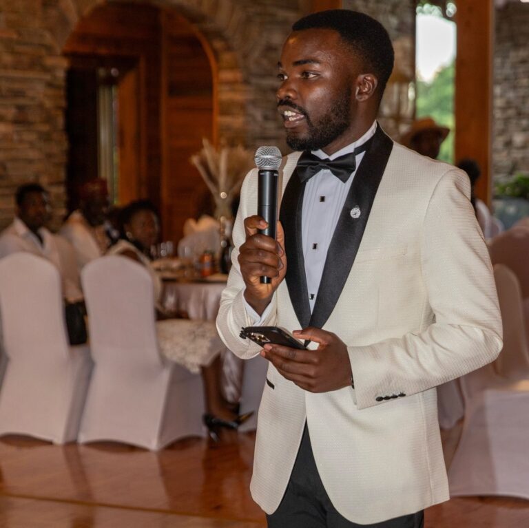 Mclevioflife MC moderating a business conference panel discussion